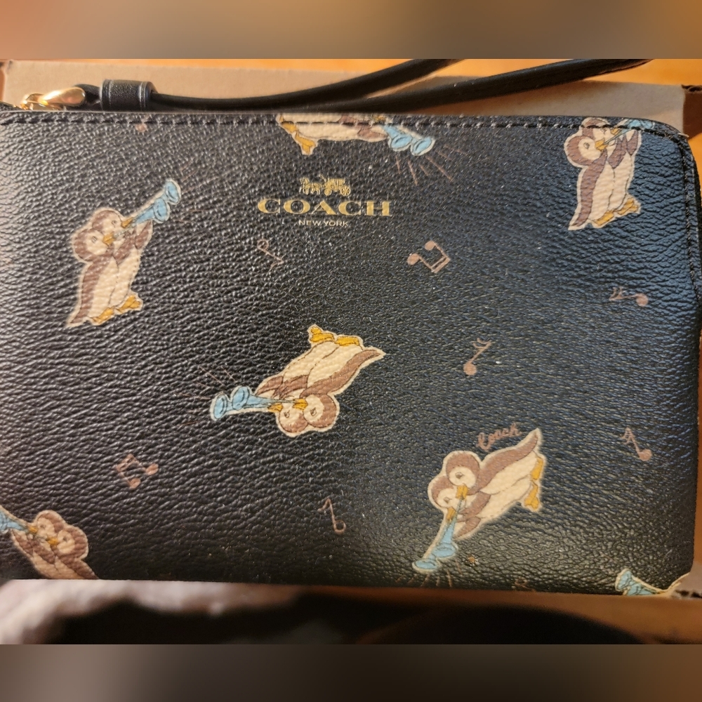 Authentic Coach Corner Zip Wristlet and card holder  With Penguin Print
